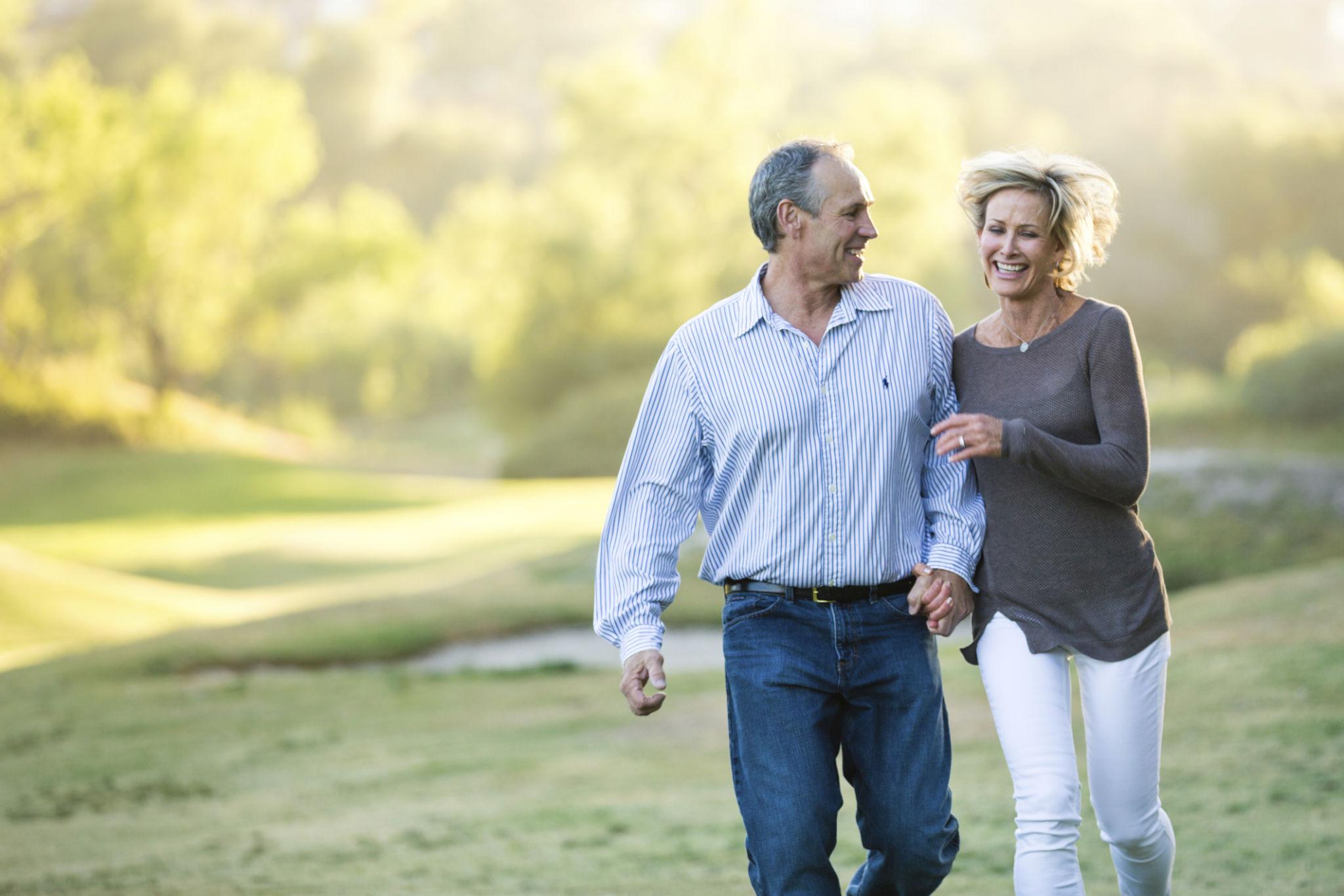 A couple walking together outdoors